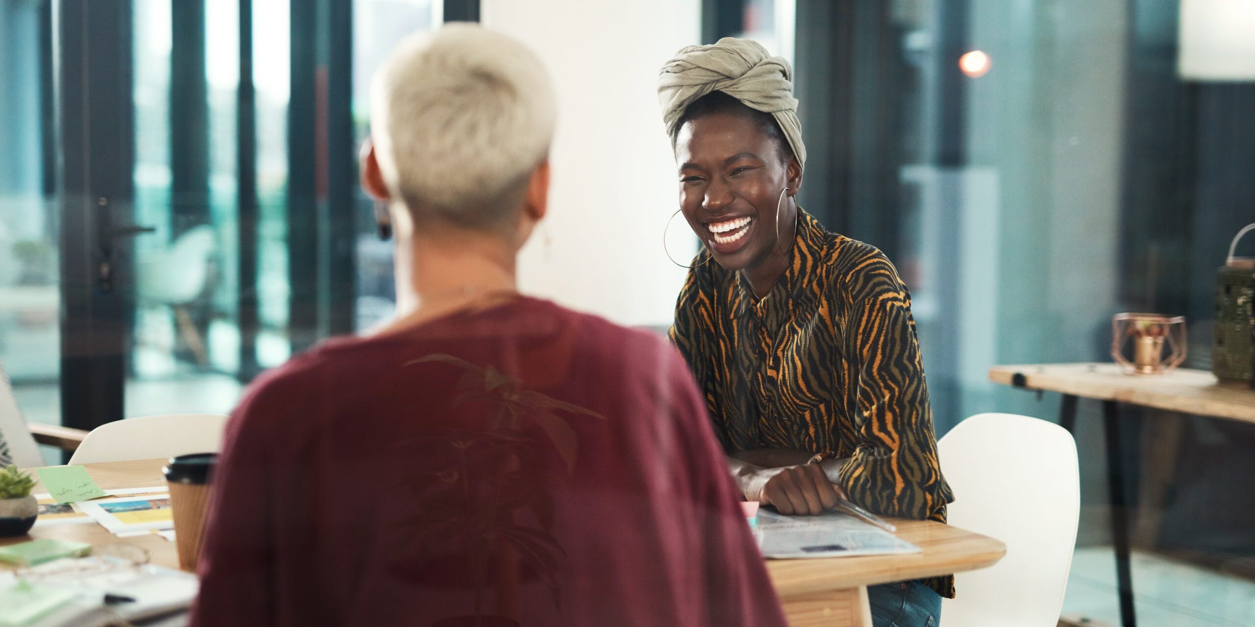 Sharing ideas is vital to success One on one meeting with two workers.