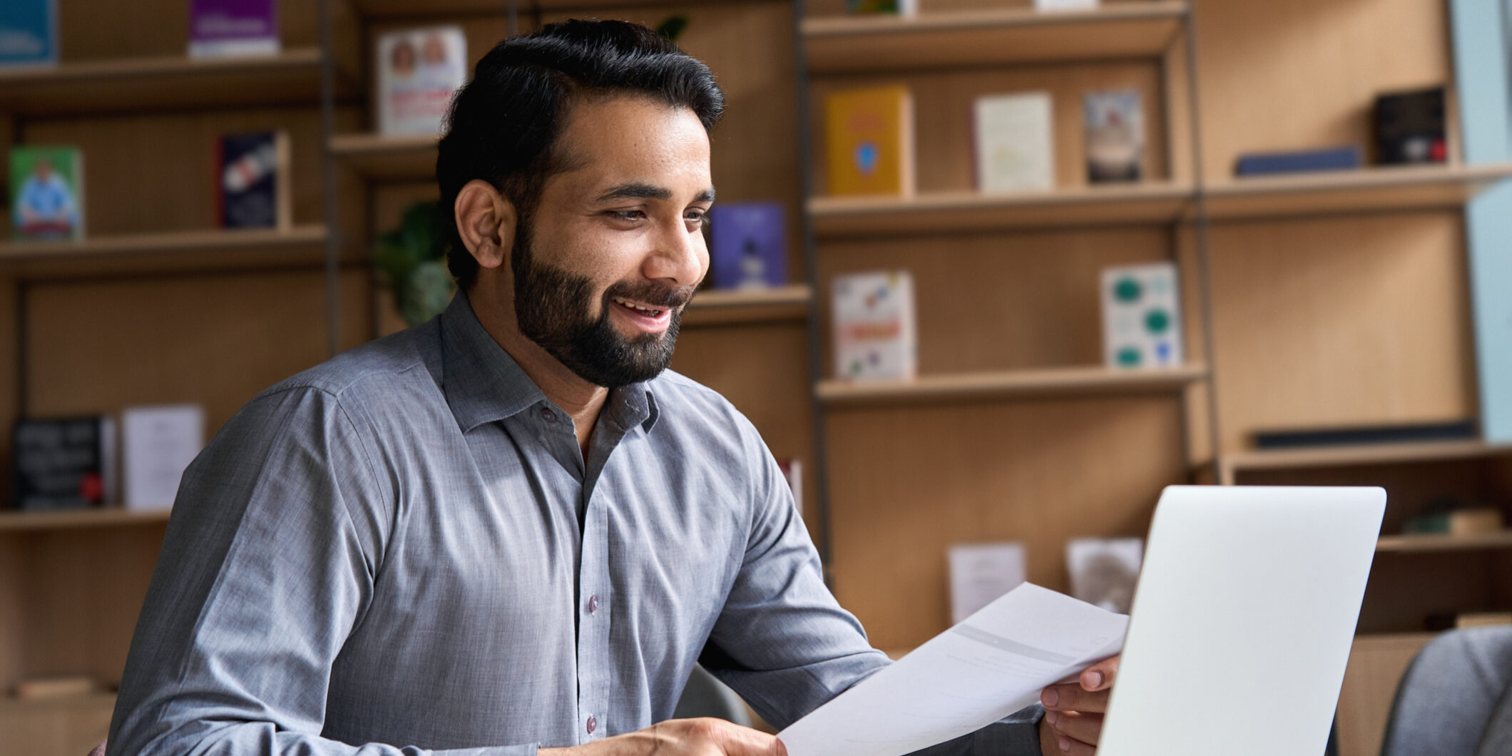 Professional reviewing compliance guidelines and changes. Professional reviewing compliance guidelines and changes.