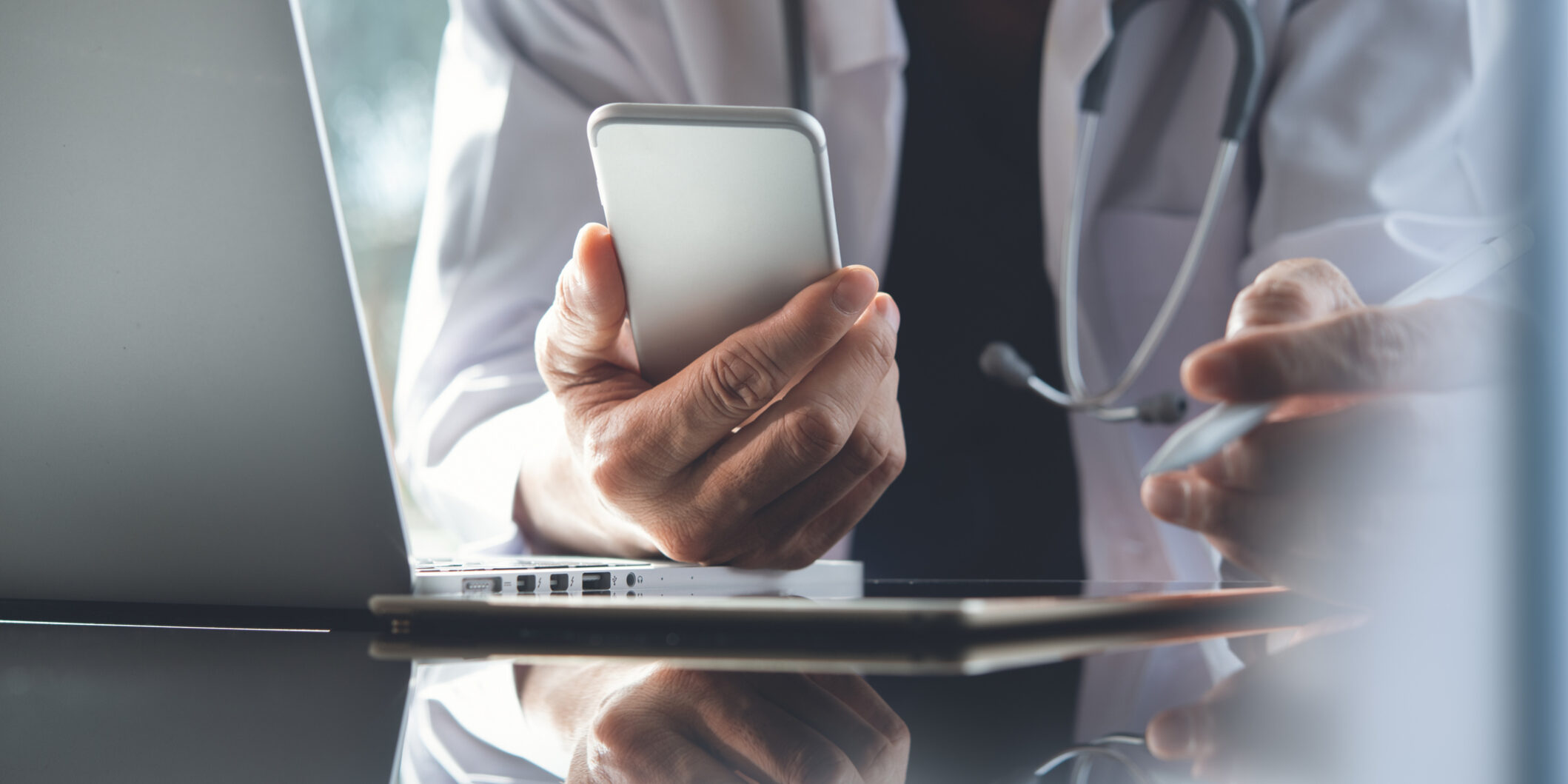 Doctor working on laptop computer