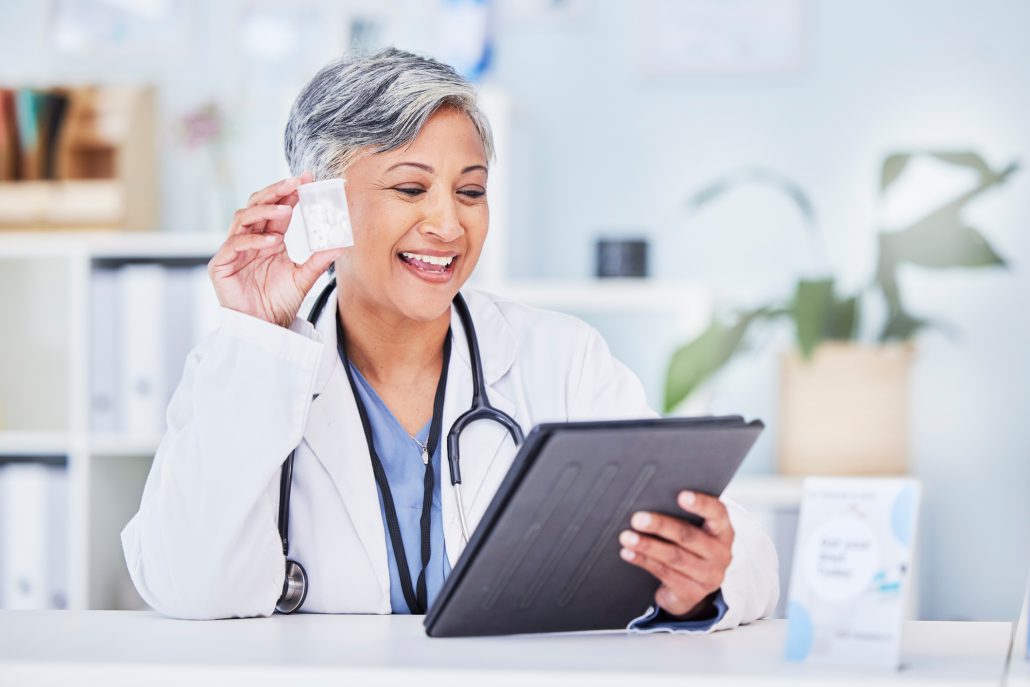 Pills, woman and doctor with a tablet, video call and connection with healthcare, advice and support. Discussion, employee and medical professional with technology, medication and online consultation