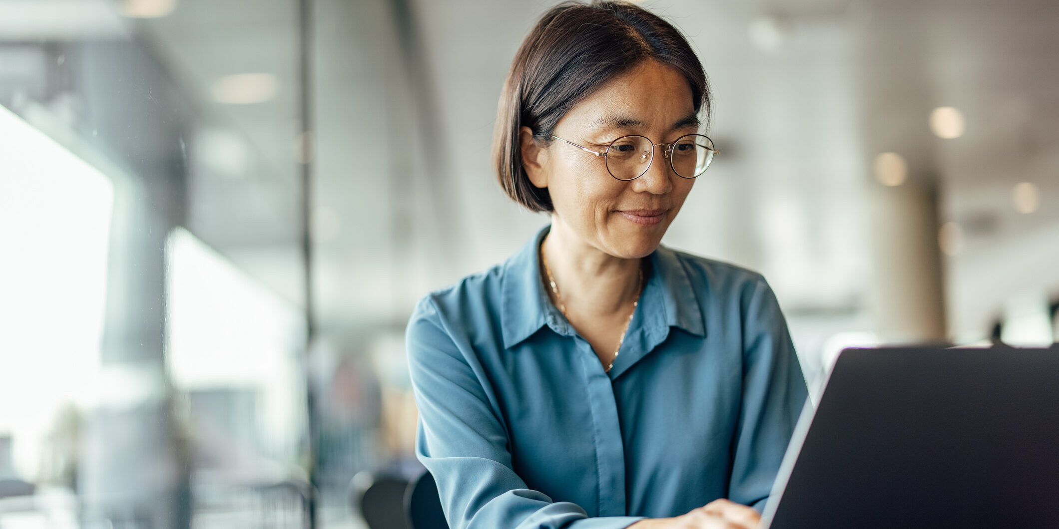Confident asian woman, trying to help her customers