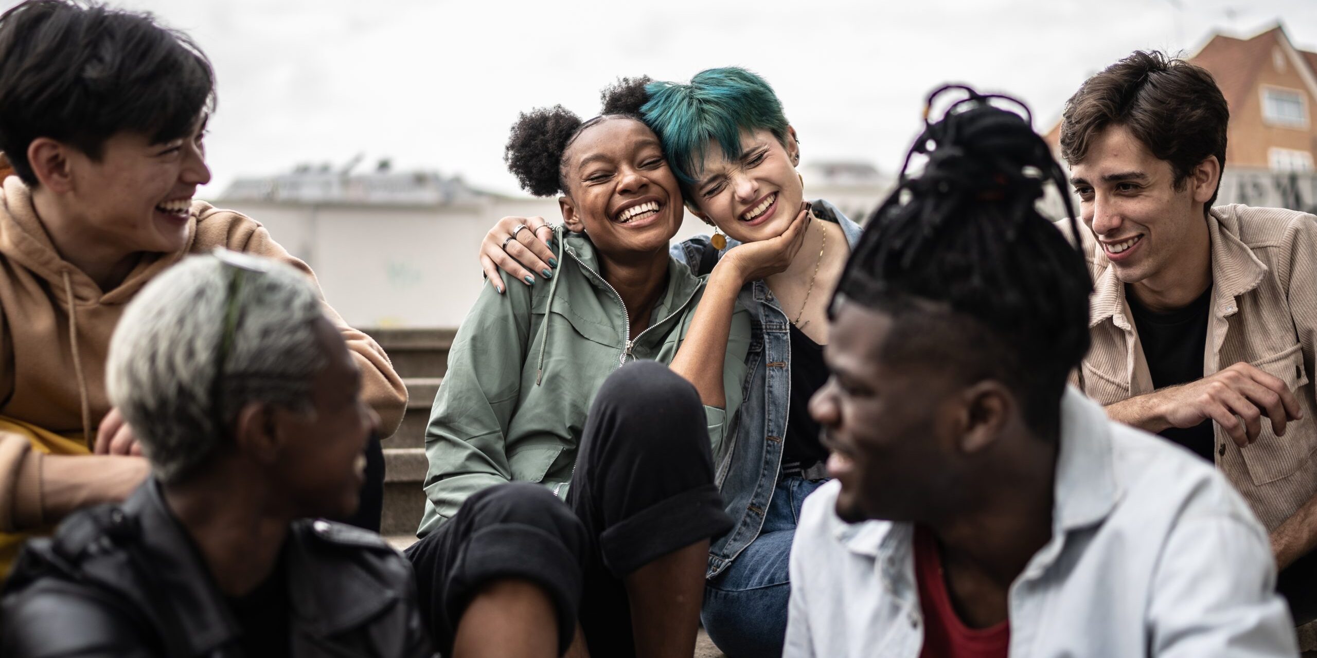Friends talking in the street