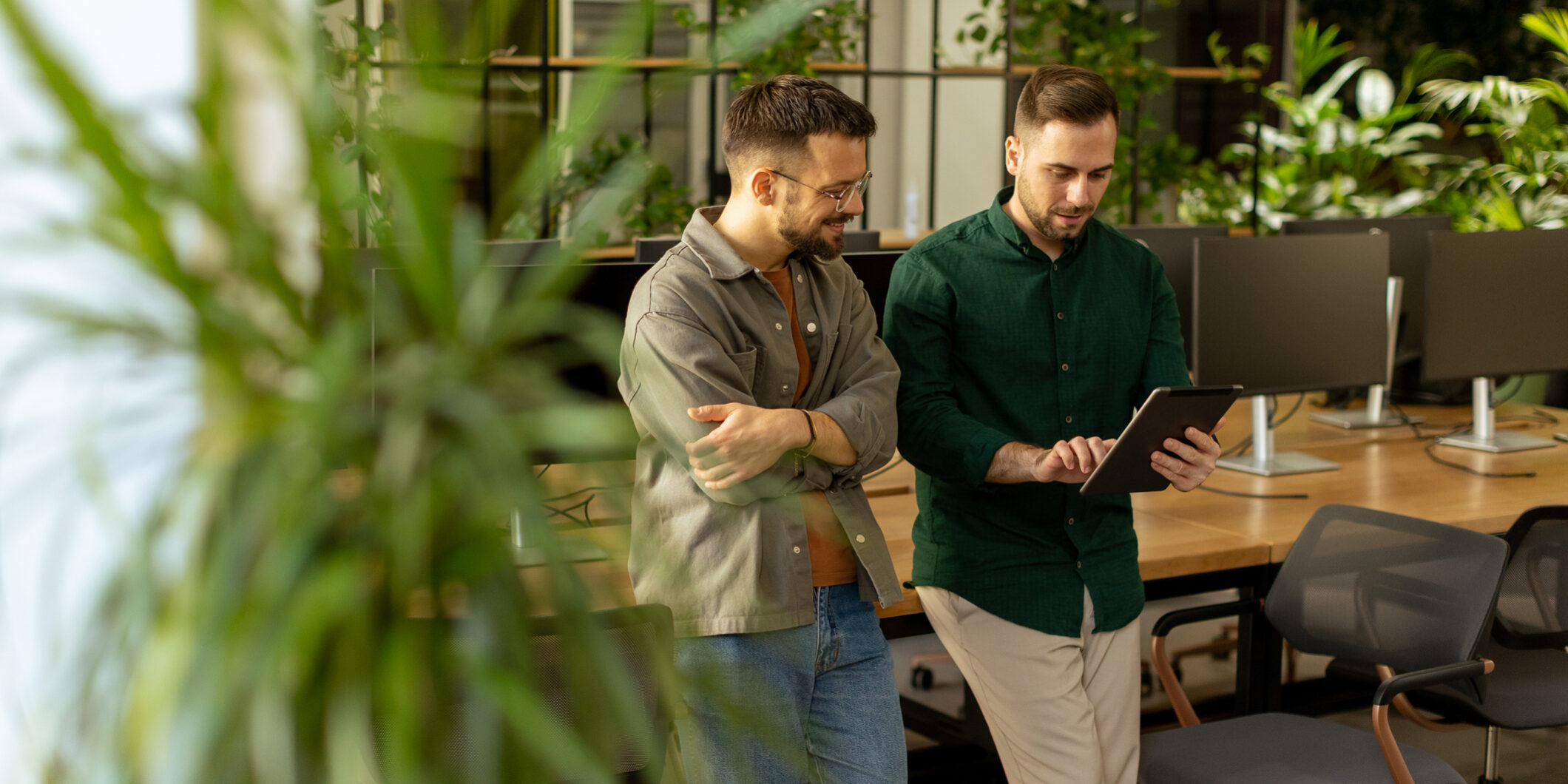 Collaborative Discussion in a Modern Office With Exposed Brick Walls